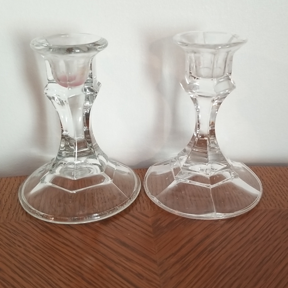 Set of 2 clear candlesticks. 4" tall.